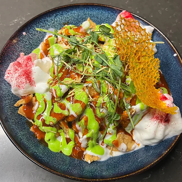 Papri chaat with yogurt and chutneys